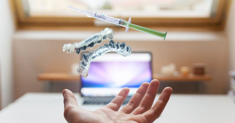 Floating Furniture - Syringe Floating Near Person's Hand