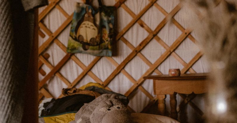 Statement Furniture - A bed inside a yurt with a book on the table