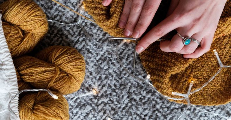 DIY Lighting - Photo Of Person Holding Brown Yarn Roll